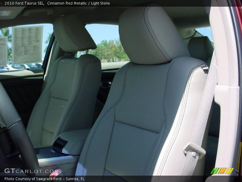 Cinnamon Red Metallic / Light Stone 2010 Ford Taurus SEL
