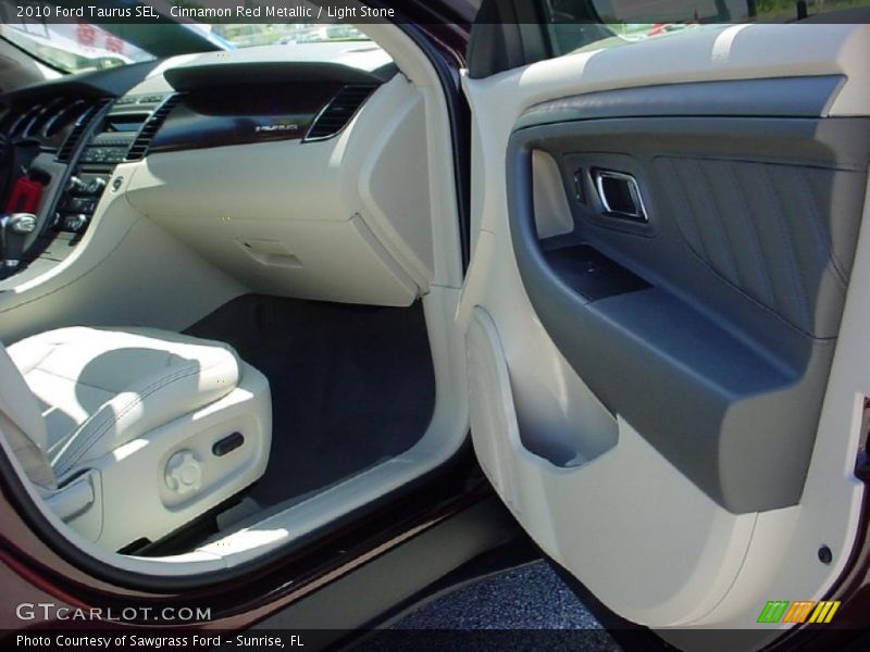 Cinnamon Red Metallic / Light Stone 2010 Ford Taurus SEL