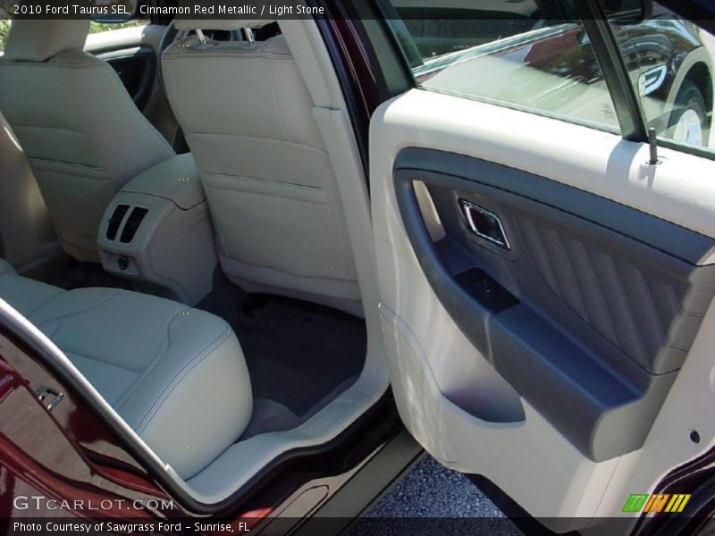 Cinnamon Red Metallic / Light Stone 2010 Ford Taurus SEL