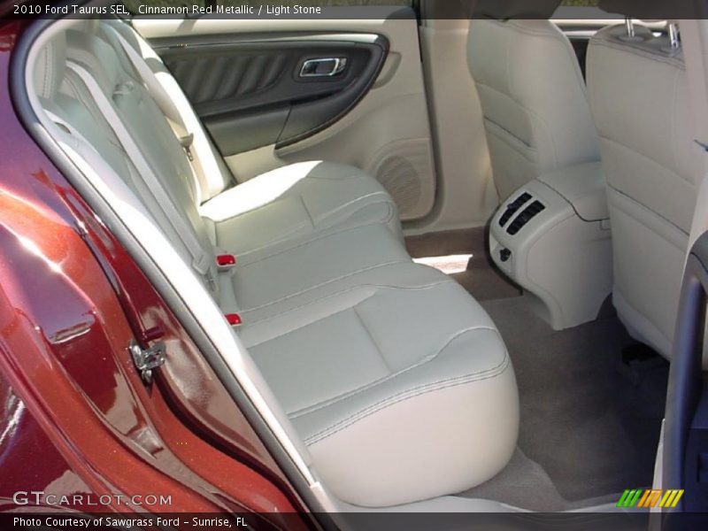 Cinnamon Red Metallic / Light Stone 2010 Ford Taurus SEL
