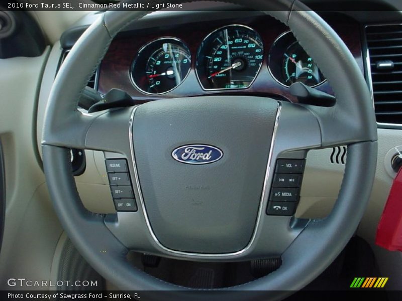 Cinnamon Red Metallic / Light Stone 2010 Ford Taurus SEL