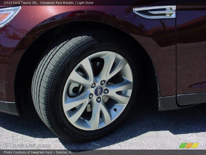 Cinnamon Red Metallic / Light Stone 2010 Ford Taurus SEL