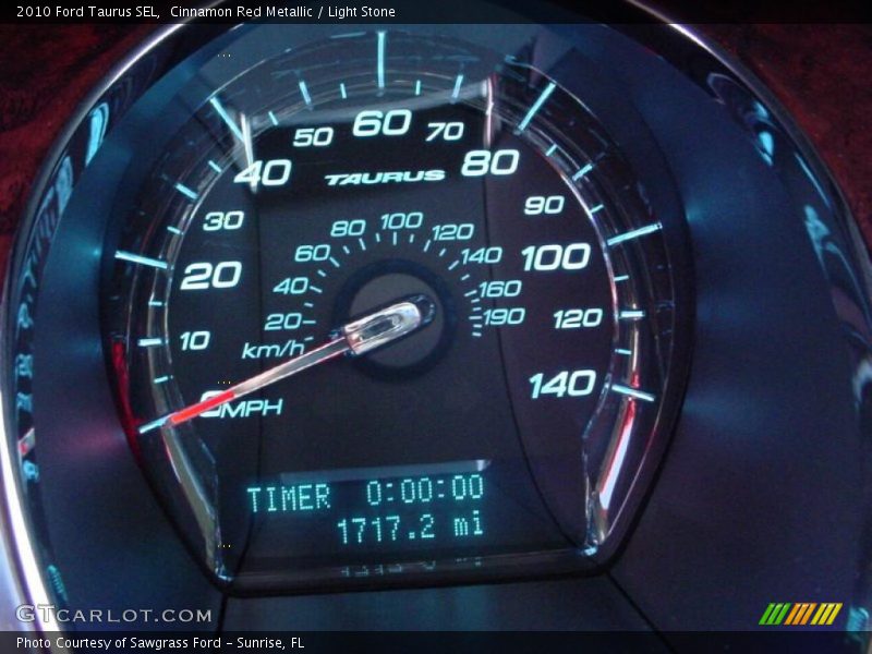Cinnamon Red Metallic / Light Stone 2010 Ford Taurus SEL