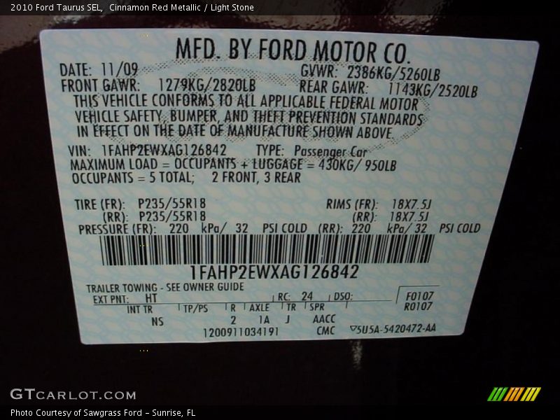 Cinnamon Red Metallic / Light Stone 2010 Ford Taurus SEL