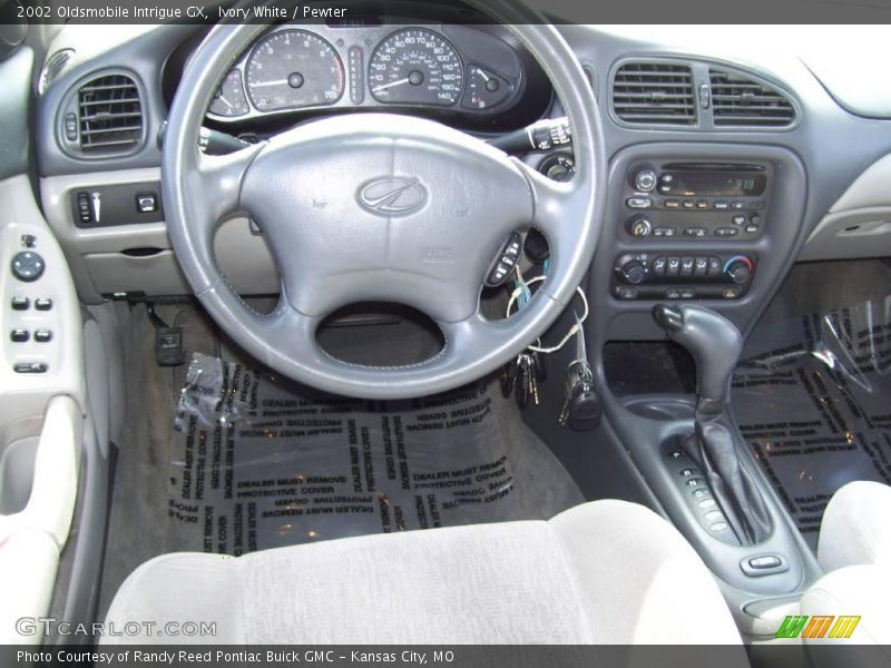 Ivory White / Pewter 2002 Oldsmobile Intrigue GX