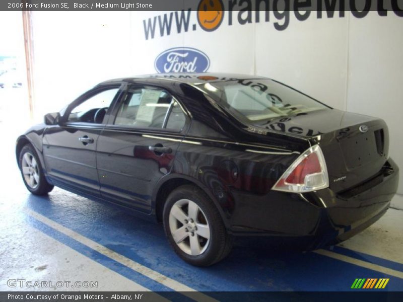 Black / Medium Light Stone 2006 Ford Fusion SE