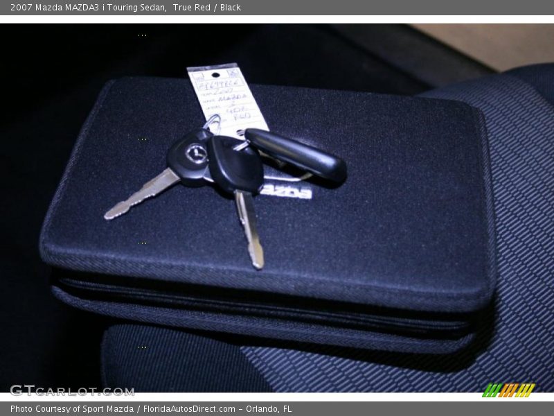 True Red / Black 2007 Mazda MAZDA3 i Touring Sedan