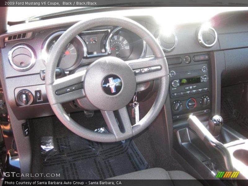 Black / Black/Black 2009 Ford Mustang V6 Coupe