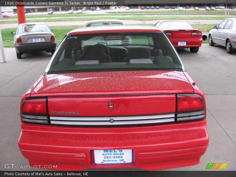 Bright Red / Pewter 1996 Oldsmobile Cutlass Supreme SL Sedan