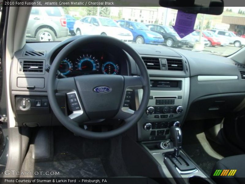 Atlantis Green Metallic / Charcoal Black 2010 Ford Fusion SE