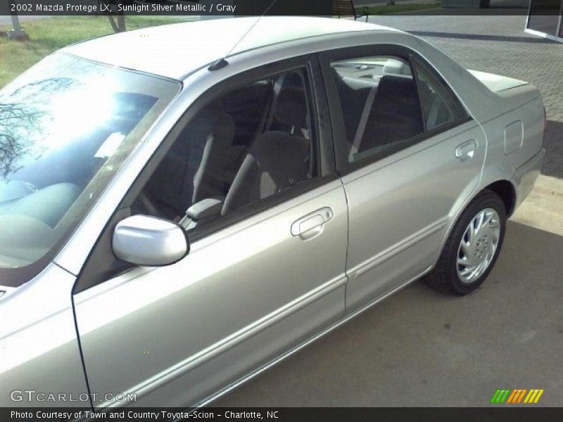 Sunlight Silver Metallic / Gray 2002 Mazda Protege LX