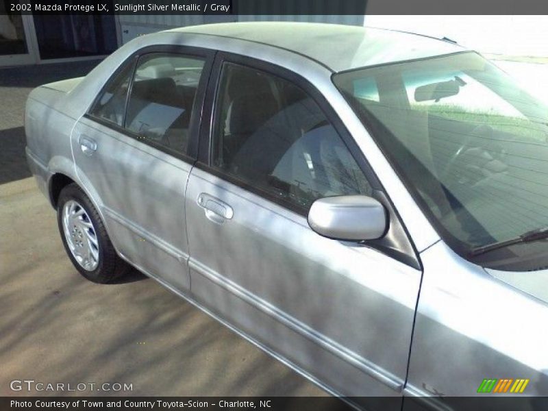Sunlight Silver Metallic / Gray 2002 Mazda Protege LX