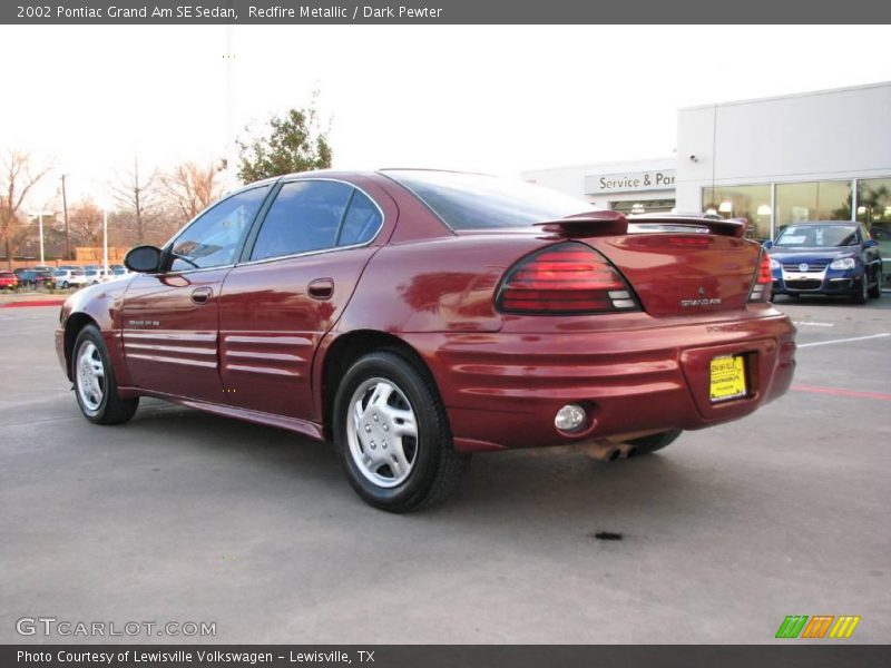 Redfire Metallic / Dark Pewter 2002 Pontiac Grand Am SE Sedan