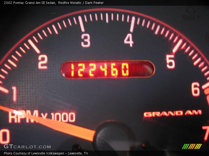 Redfire Metallic / Dark Pewter 2002 Pontiac Grand Am SE Sedan