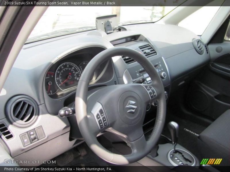 Vapor Blue Metallic / Black 2009 Suzuki SX4 Touring Sport Sedan