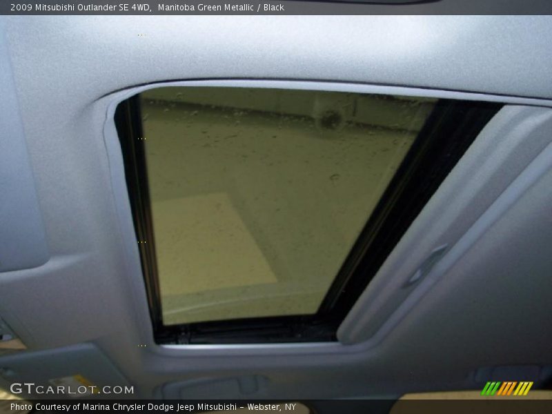 Manitoba Green Metallic / Black 2009 Mitsubishi Outlander SE 4WD