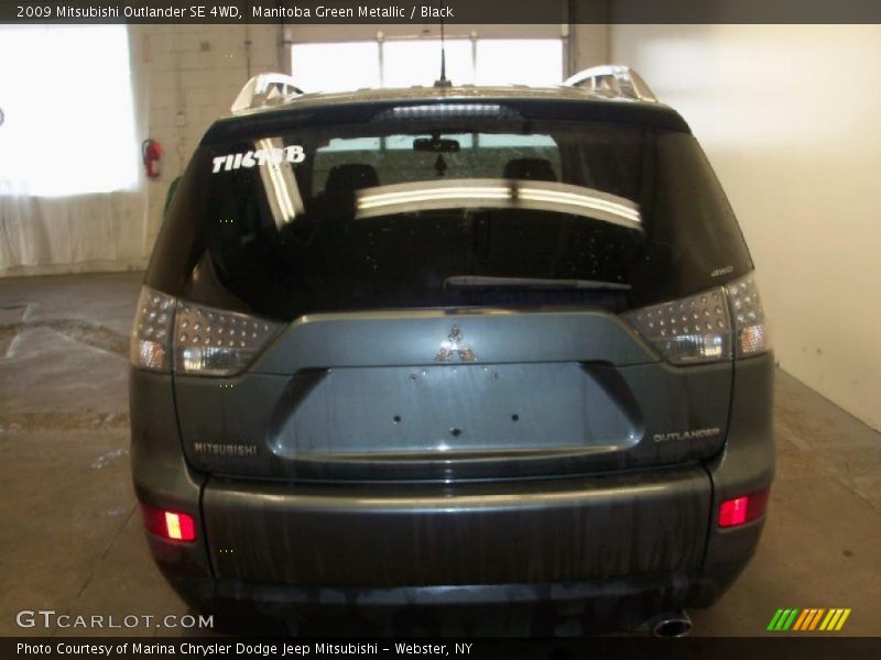 Manitoba Green Metallic / Black 2009 Mitsubishi Outlander SE 4WD