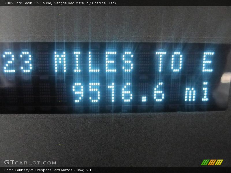 Sangria Red Metallic / Charcoal Black 2009 Ford Focus SES Coupe