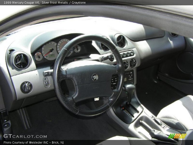 Silver Frost Metallic / Graystone 1999 Mercury Cougar V6