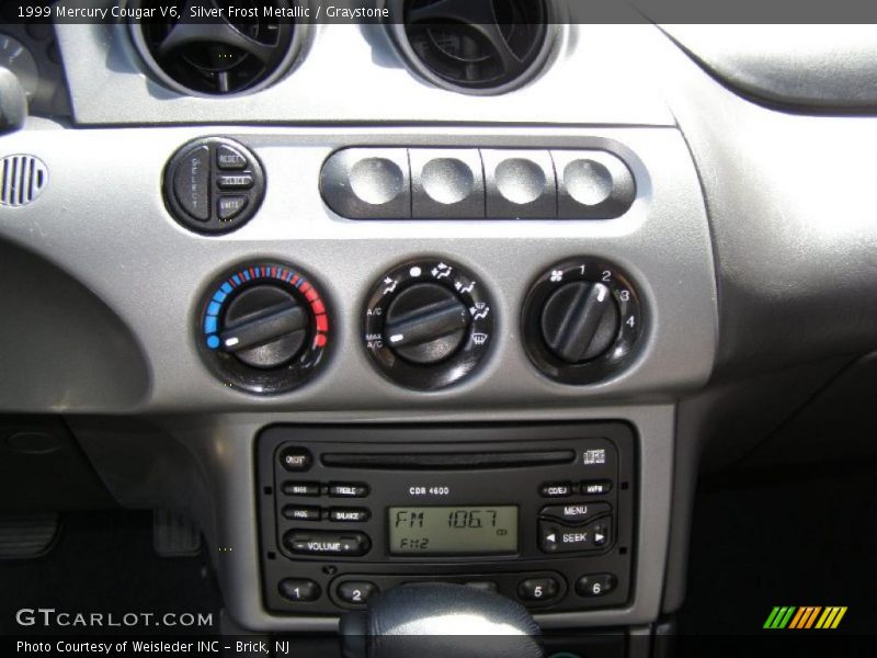 Silver Frost Metallic / Graystone 1999 Mercury Cougar V6