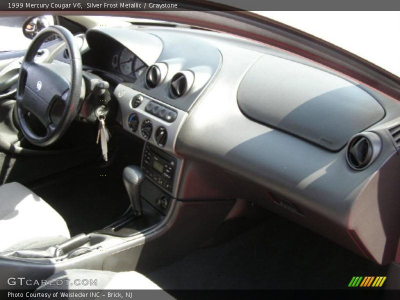 Silver Frost Metallic / Graystone 1999 Mercury Cougar V6