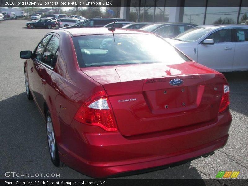 Sangria Red Metallic / Charcoal Black 2010 Ford Fusion SE