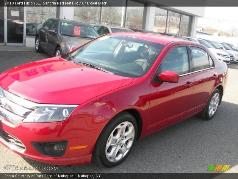 Sangria Red Metallic / Charcoal Black 2010 Ford Fusion SE