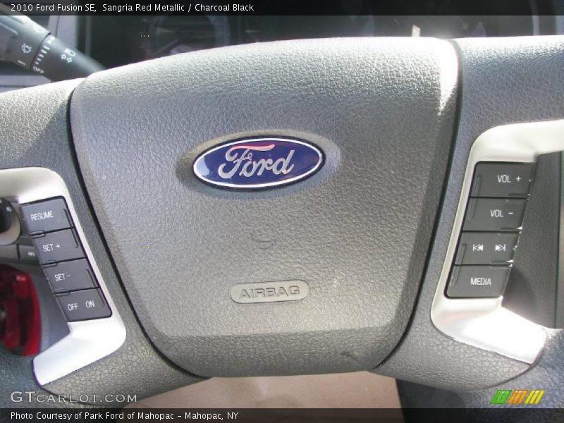 Sangria Red Metallic / Charcoal Black 2010 Ford Fusion SE