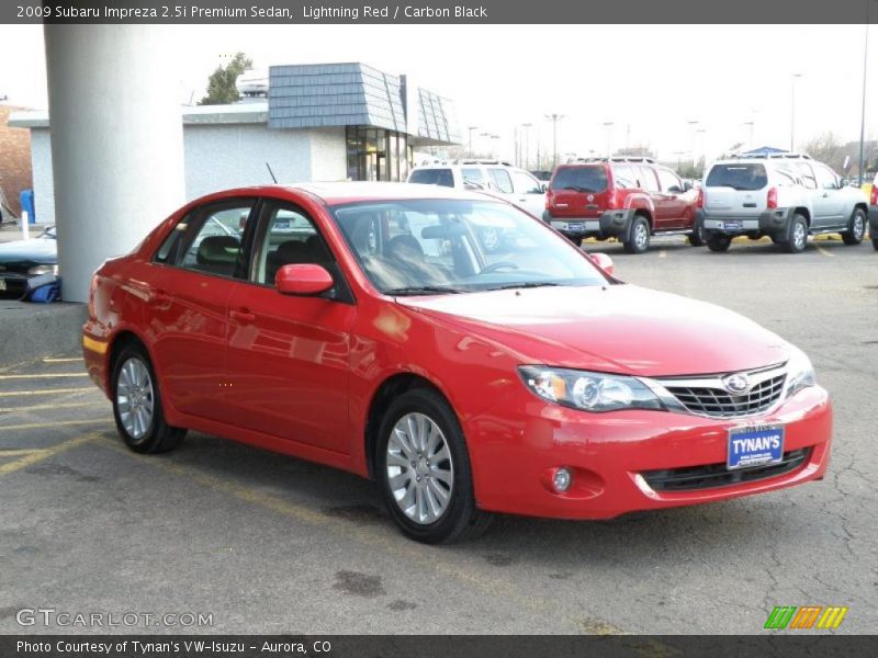 Lightning Red / Carbon Black 2009 Subaru Impreza 2.5i Premium Sedan