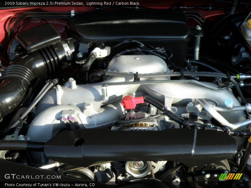 Lightning Red / Carbon Black 2009 Subaru Impreza 2.5i Premium Sedan