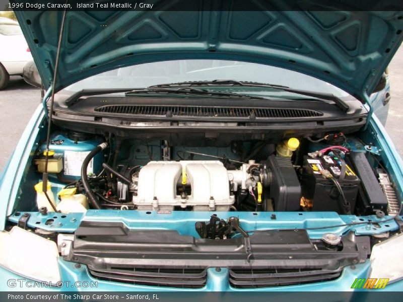 Island Teal Metallic / Gray 1996 Dodge Caravan