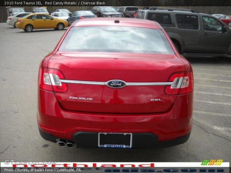 Red Candy Metallic / Charcoal Black 2010 Ford Taurus SEL