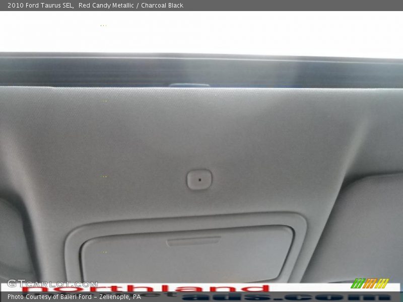 Red Candy Metallic / Charcoal Black 2010 Ford Taurus SEL