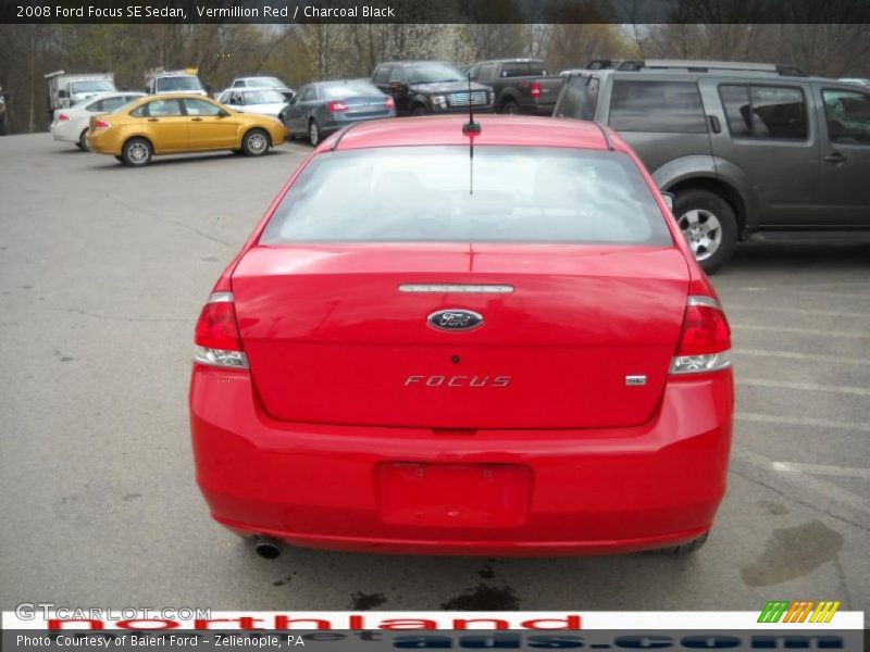 Vermillion Red / Charcoal Black 2008 Ford Focus SE Sedan