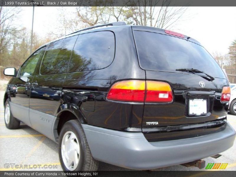 Black / Oak Beige 1999 Toyota Sienna LE