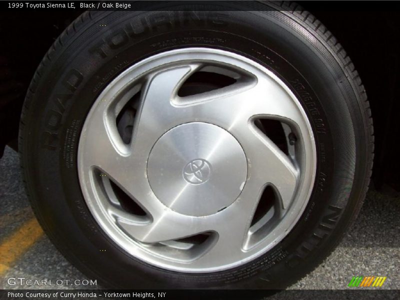 Black / Oak Beige 1999 Toyota Sienna LE