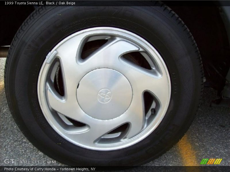 Black / Oak Beige 1999 Toyota Sienna LE