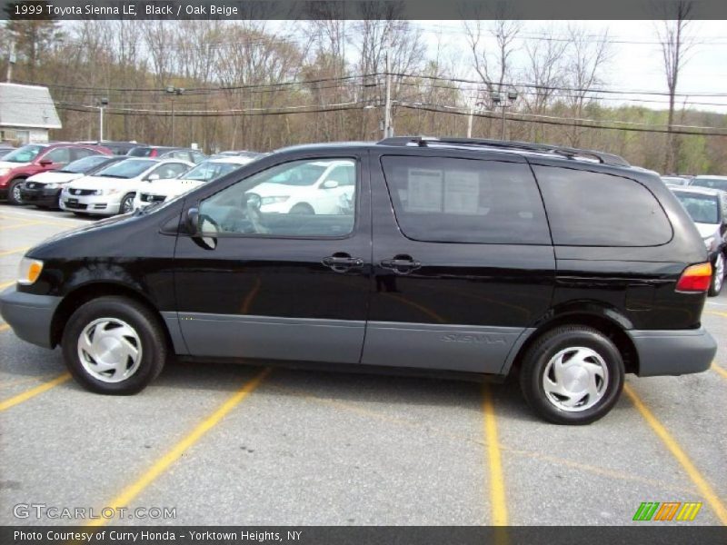 Black / Oak Beige 1999 Toyota Sienna LE