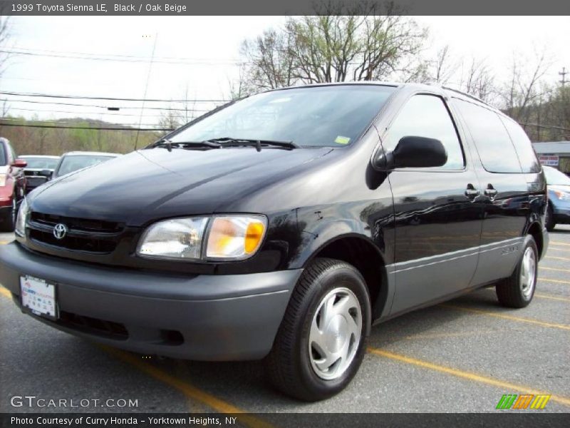 Black / Oak Beige 1999 Toyota Sienna LE