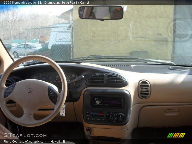 Champagne Beige Pearl / Camel 1999 Plymouth Voyager SE