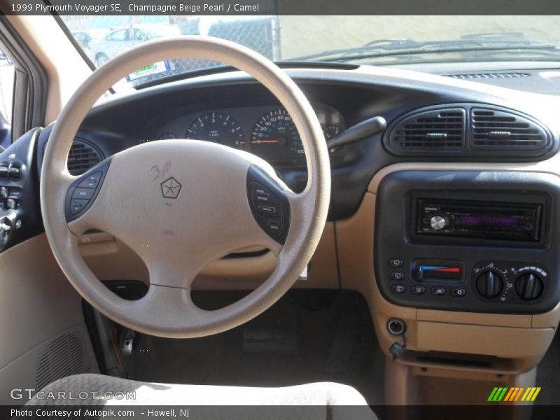 Champagne Beige Pearl / Camel 1999 Plymouth Voyager SE