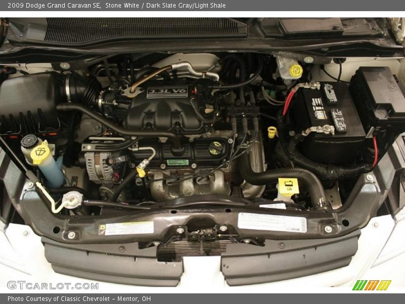 Stone White / Dark Slate Gray/Light Shale 2009 Dodge Grand Caravan SE