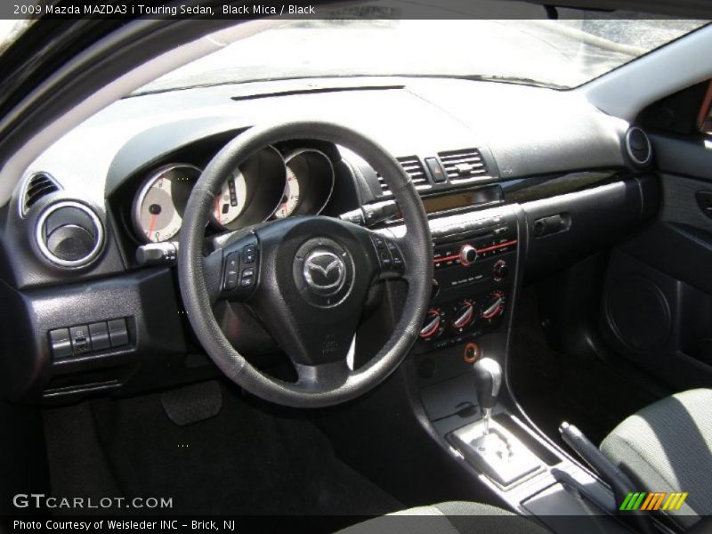 Black Mica / Black 2009 Mazda MAZDA3 i Touring Sedan