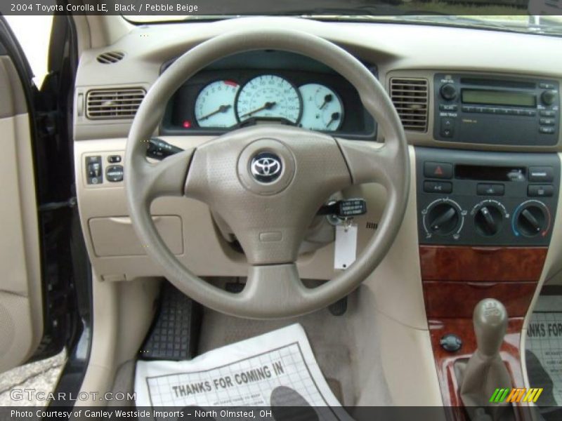 Black / Pebble Beige 2004 Toyota Corolla LE