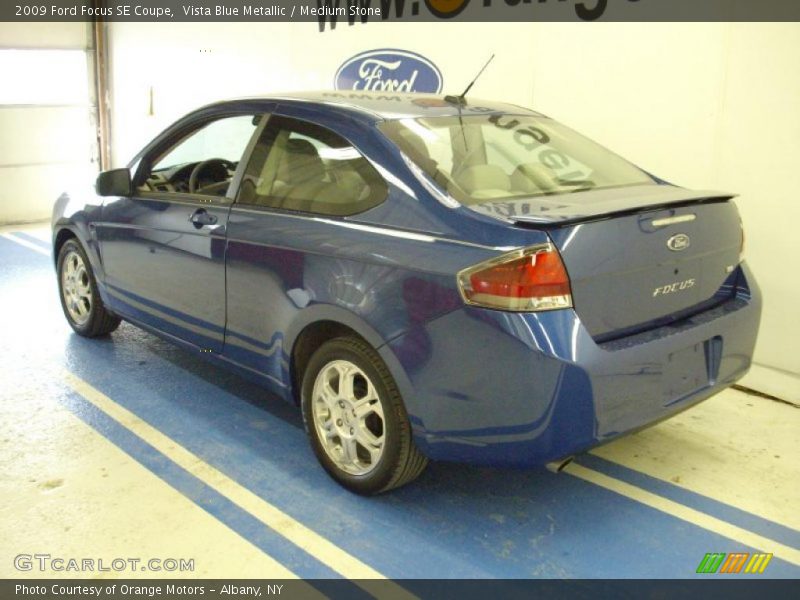 Vista Blue Metallic / Medium Stone 2009 Ford Focus SE Coupe