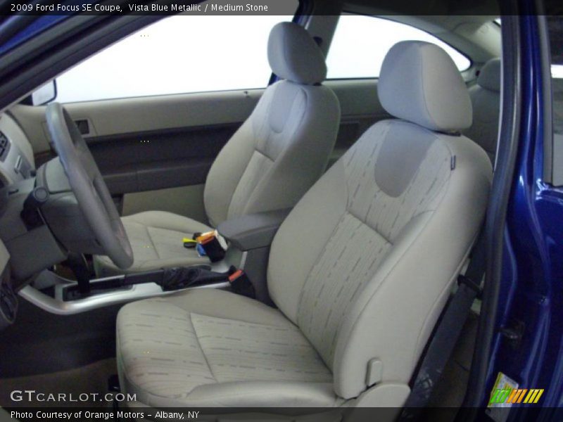 Vista Blue Metallic / Medium Stone 2009 Ford Focus SE Coupe