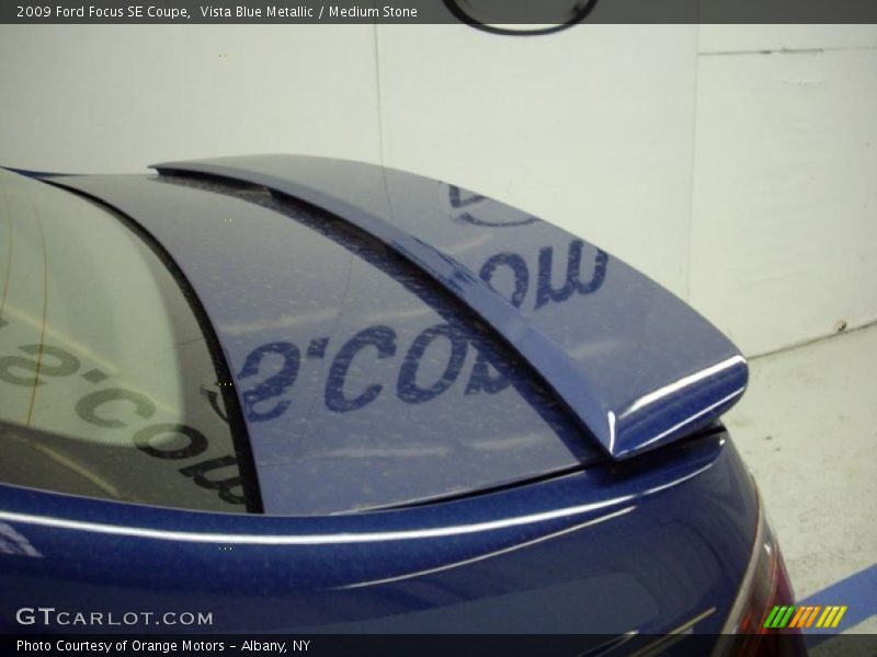 Vista Blue Metallic / Medium Stone 2009 Ford Focus SE Coupe