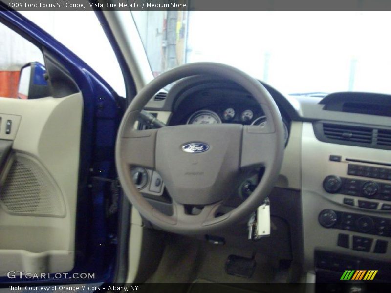 Vista Blue Metallic / Medium Stone 2009 Ford Focus SE Coupe