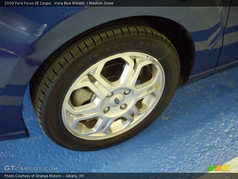 Vista Blue Metallic / Medium Stone 2009 Ford Focus SE Coupe