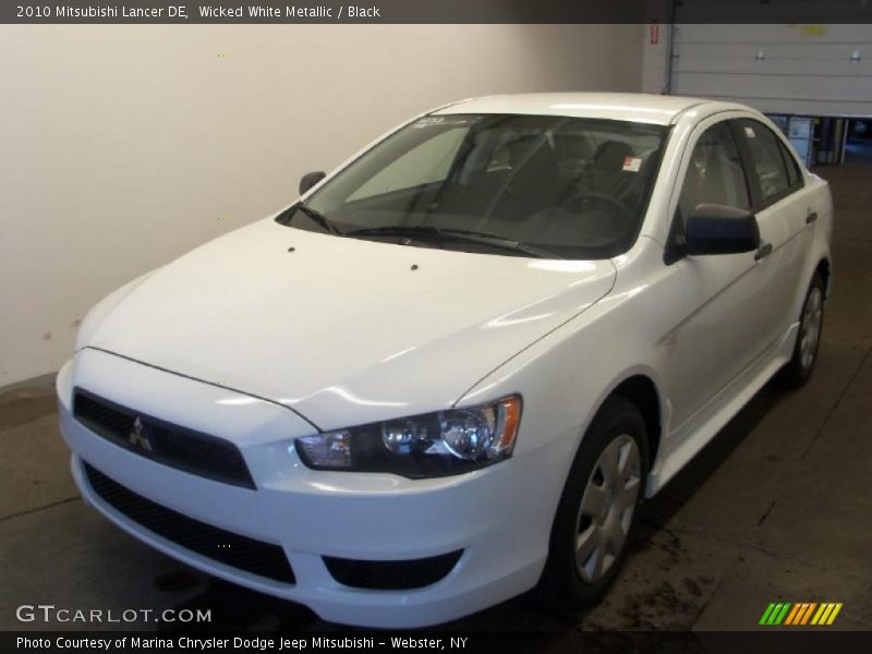 Wicked White Metallic / Black 2010 Mitsubishi Lancer DE